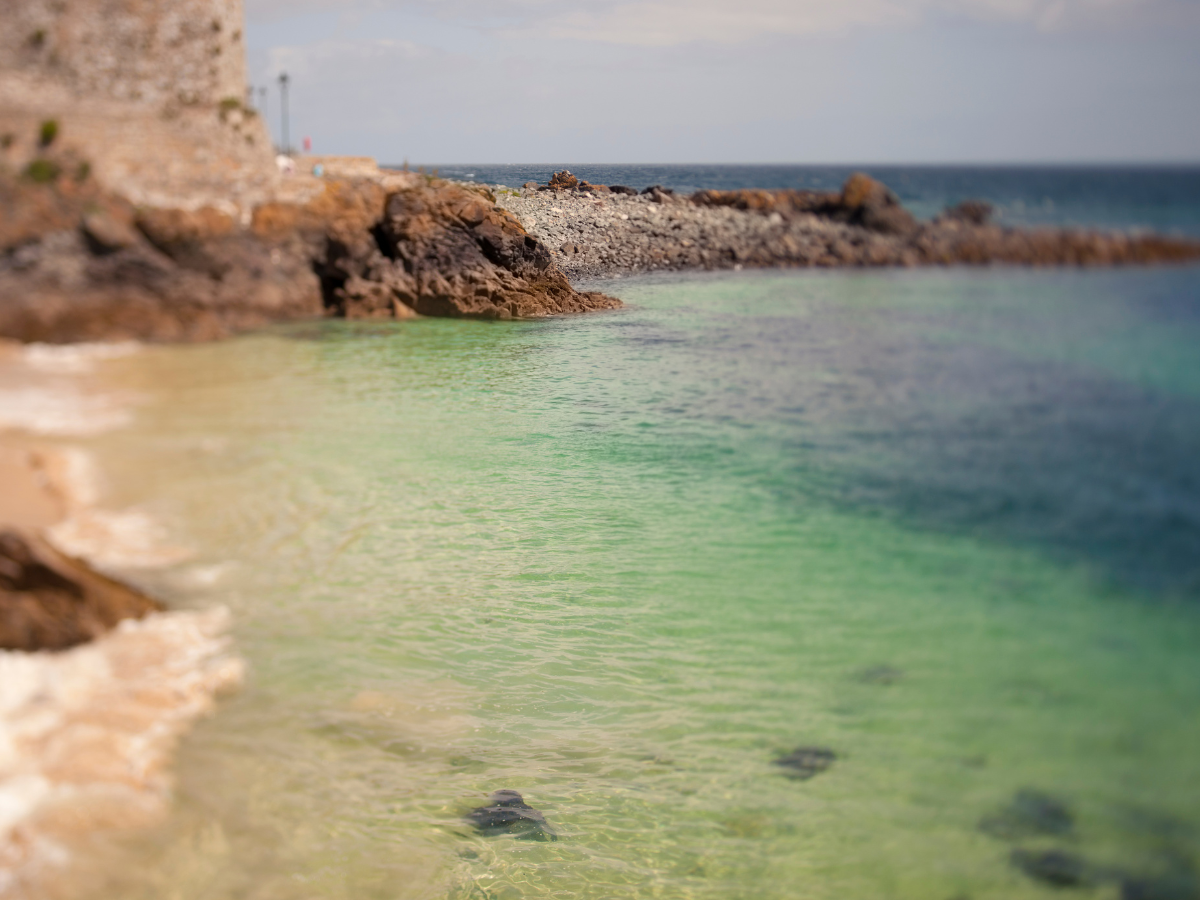 scattering ashes on Fistral Beach, Cornwall